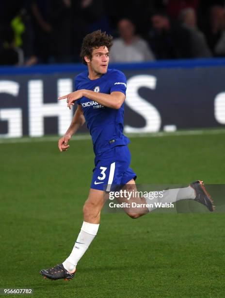 Marcos Alonso of Chelsea celebrates after scoring his sides first goal during the Premier League match between Chelsea and Huddersfield Town at...