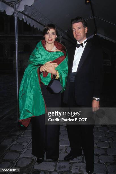 Isabella Rossellini et David Lynch lors de la soirée de lancement du parfum 'Trésor' de lancôme à Paris en juin 1990, France.