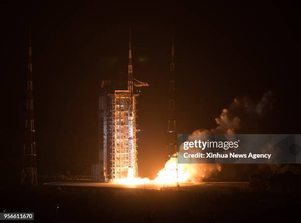 May 9, 2018 -- Photo taken on May 9, 2018 shows the Gaofen-5 satellite being launched off the back of a Long March 4C rocket at 2:28 a.m. Beijing...