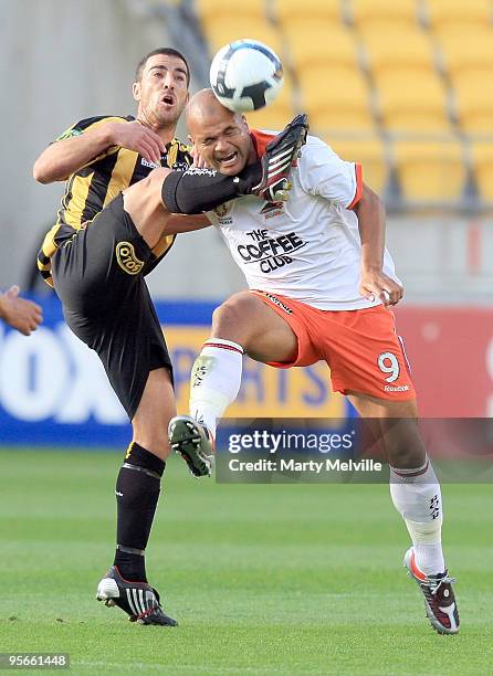 Manny Muscat of the Phoenix is tackled by Sergio Van Dijk of the Roar during the round 22 A-League match between the Wellington Phoenix and the...