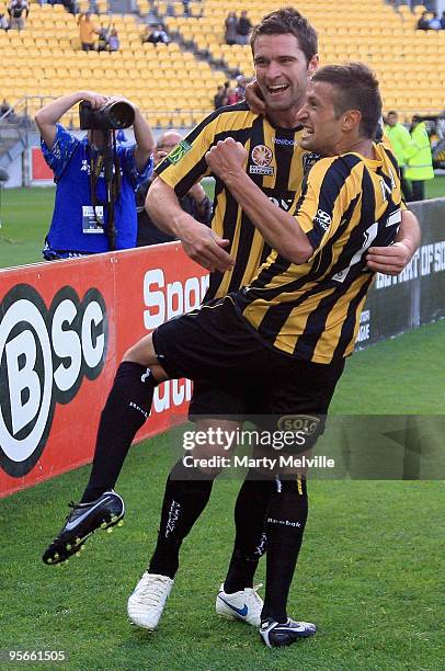 Tim Brown and Vince Lia of the Phoenix celebrate a goal during the round 22 A-League match between the Wellington Phoenix and the Brisbane Roar at...