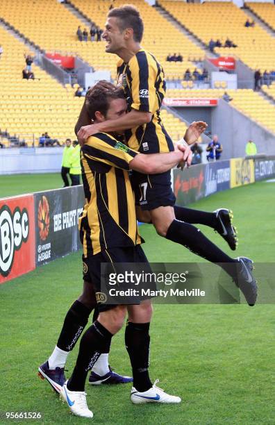 Tim Brown and Vince Lia of the Phoenix celebrate a goal during the round 22 A-League match between the Wellington Phoenix and the Brisbane Roar at...
