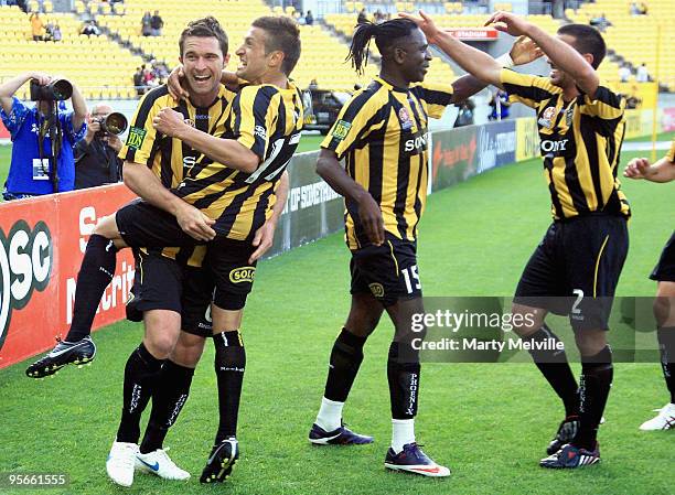 Tim Brown, Vince Lia, Eugene Dadi and Manny Muscat of the Phoenix celebrate a goal during the round 22 A-League match between the Wellington Phoenix...