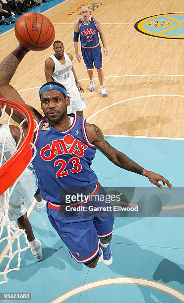 LeBron James of the Cleveland Cavaliers goes to the basket against the Denver Nuggets on January 8, 2010 at the Pepsi Center in Denver, Colorado....