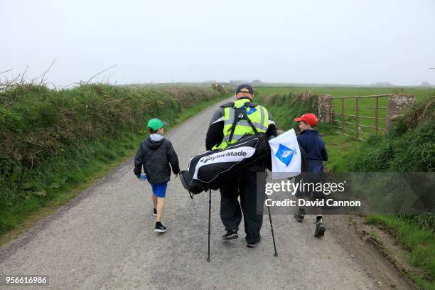 Nick Edmund of England a two time cancer survivor is joined by two eight year olds Toby Cannon and Cashel O'Donoghue amongst a group of family and...