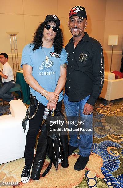 Musician Slash and TV personality Montel Williams attend the amfAR & Pokerstars Celebrity Charity Poker Tournament at Atlantis Paradise Island on...