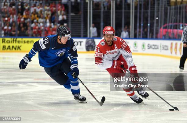 Kasperi Kapanen of Team Finland and Frans Nielsen of Team Denmark during the IIHF World Championship game between Finland and Denmark on May 9, 2018...