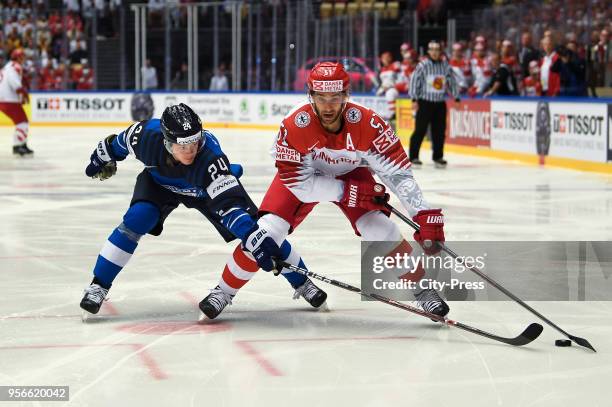 Kasperi Kapanen of Team Finland and Frans Nielsen of Team Denmark during the IIHF World Championship game between Finland and Denmark on May 9, 2018...