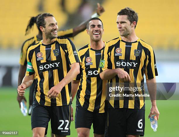 Tim Brown, Manny Muscat and Andrew Durante of the Phoenix celebrate after their win during the round 22 A-League match between the Wellington Phoenix...