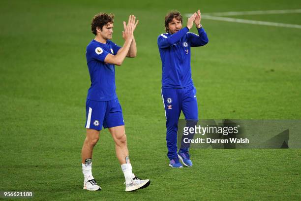 Marcos Alonso of Chelsea and Antonio Conte, Manager of Chelsea show appreication to the fans after the Premier League match between Chelsea and...