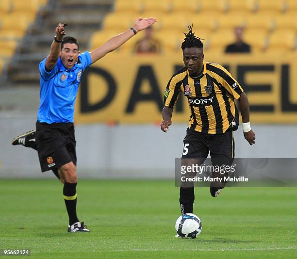 Eugene Dadi of the Phoenix dribbles the ball during the round 22 A-League match between the Wellington Phoenix and the Brisbane Roar at Westpac...