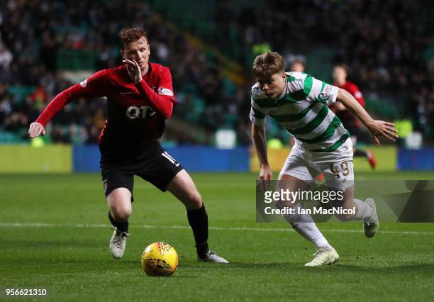 Scott Boyd of Kilmarnock vies with James Forrest of Celtic during the Scottish Premier League between Celtic and Kilmarnock at Celtic Park on May 9,...