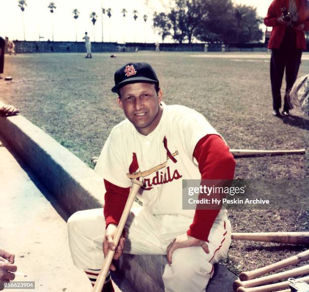 Stan Musial of the St. Louis Cardinals poses for a portrait on the dugout steps during Spring Training circa March, 1958 in St. Petersburg, Florida.