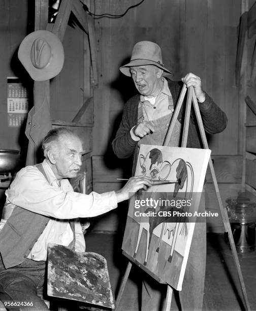 Television rural comedy, The Real McCoys. Pictured left to right Andy Clyde and Walter Brennan . Episode, The Artist, originally broadcast November...