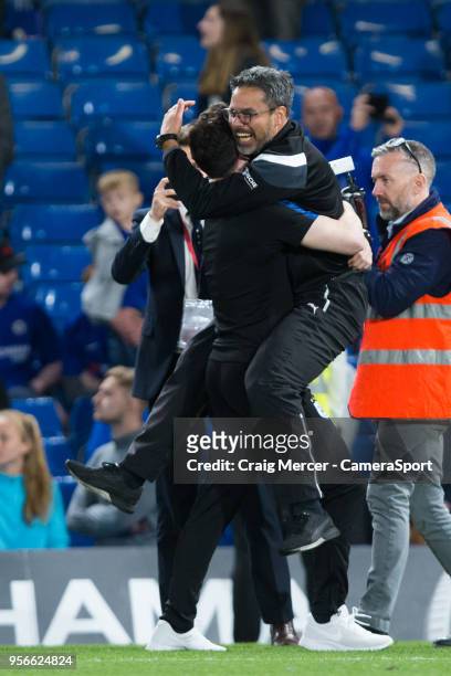 Huddersfield Town manager David Wagner celebrates with team members after the Premier League match between Chelsea and Huddersfield Town at Stamford...