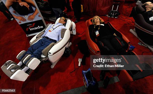 Stephen Ritter and Sharon Ritter use Inada Sogno massage chairs at the 2010 International Consumer Electronics Show at the Las Vegas Convention...