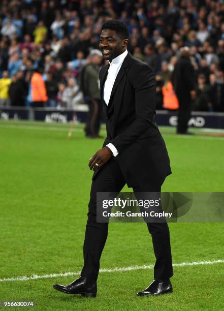 Kolo Toure walks onto the pitch after the Premier League match between Manchester City and Brighton and Hove Albion at Etihad Stadium on May 9, 2018...