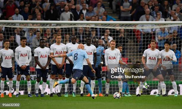 Newcastle player Jonjo Shelvey takes a free kick at a packed Spurs wall during the Premier League match between Tottenham Hotspur and Newcastle...