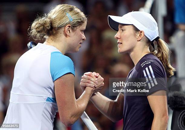 Kim Clijsters of Belgium and Justine Henin of Belgium shake hands after the Women's final during day seven of the Brisbane International 2010 at...