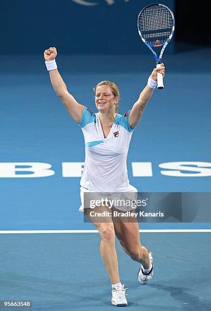 Kim Clijsters of Belgium celebrates victory after winning the Womens final match against Justine Henin of Belgium during day seven of the Brisbane...