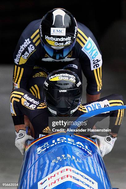 Team Germany 2 with pilot Thomas Florschuetz of Germany and Richard Adjei Otto wins the two men's Bobsleigh World Cup event on January 9, 2010 in...