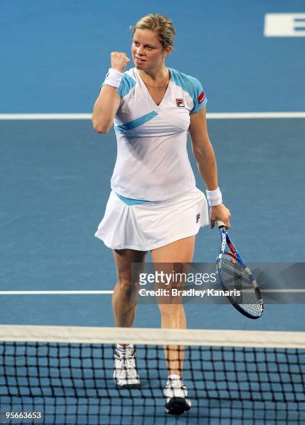 Kim Clijsters of Belgium celebrates victory after winning the Womens final match against Justine Henin of Belgium during day seven of the Brisbane...