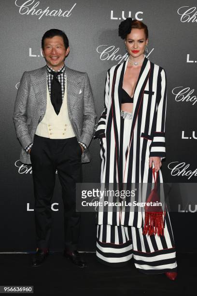 Wei Koh and Crazy Rouge attend the Chopard Gentleman's Evening at Hotel Martinez on May 9, 2018 in Cannes, France.