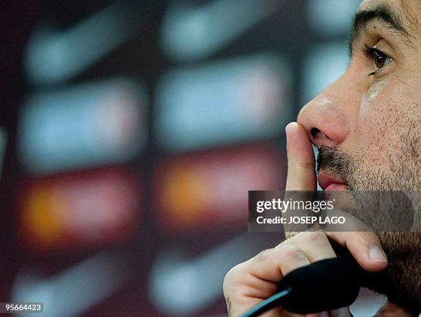 Barcelona's coach Pep Guardiola listens to questions during a press conference after a training session at Ciutat Esportiva Joan Gamper near...