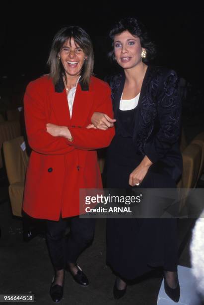 Dominique Cantien et Anne Sinclair lors d'une soirée à Paris en octobre 1989, France.