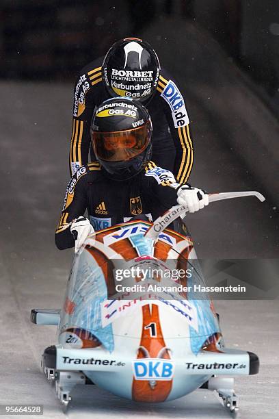 Team Germany 1 with pilot Sandra Kiriasis and Christin Senkel start at the first run of the two women's Bobsleigh World Cup event on January 9, 2010...