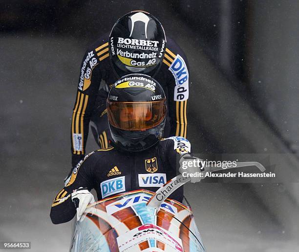 Team Germany 1 with pilot Sandra Kiriasis and Christin Senkel start at the first run of the two women's Bobsleigh World Cup event on January 9, 2010...