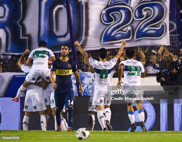 Nicolas Colazo of Gimnasia La Plata celebrates with teammates after scoring the first goal of his team during a match between Gimnasia y Esgrima La...