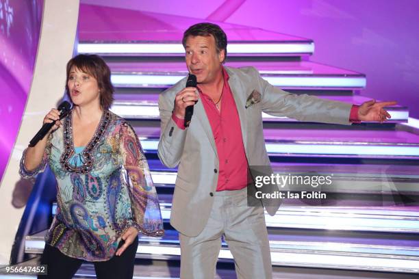 German singer Nicki and German singer Patrick Lindner perform during the tv show 'Stefanie Hertel - Die grosse Show zum Muttertag' on May 8, 2018 in...