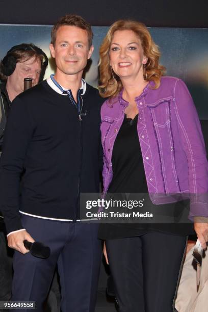 Alexander Bommes and Bettina Tietjen attend the photo call for the tv show 'Tietjen und Bommes' on May 9, 2018 in Hamburg, Germany.