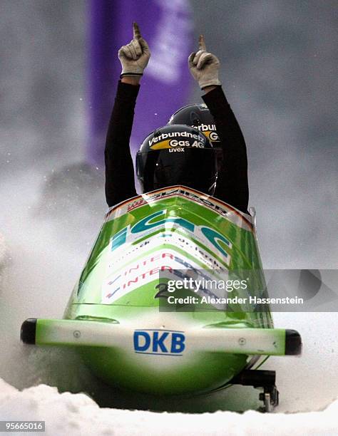 Pilot Cathleen Martini and Romy Logsch of Team Germany 2 celebrates winning after the final run of the two women's Bobsleigh World Cup event on...