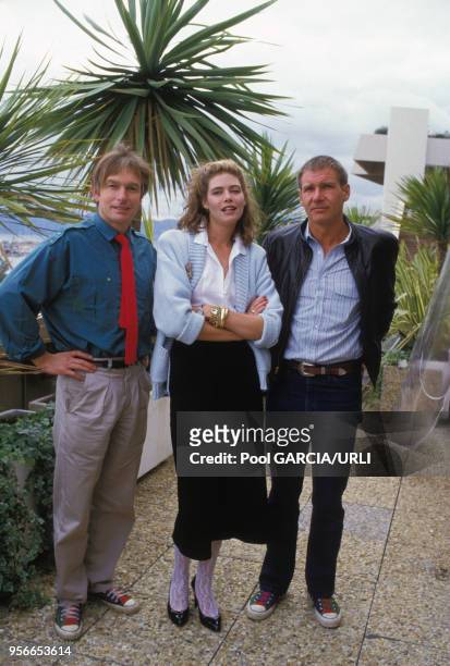 Portrait de Peter Weir, Kelly McGillis et Harrison Ford pour le film 'Witness' lors du Festival de Cannes en mai 1985, France.
