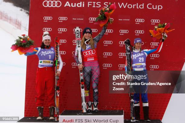 Nadja Kamer of Switzerland , Lindsey Vonn of the USA and Ingrid Jacquemod of France celebrate on the podium during the Audi FIS Alpine Ski World Cup...