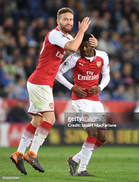 Shkodran Mustafi and Ainsley Maitland-Niles celebrate the Arsenal goal during the Premier League match between Leicester City and Arsenal at The King...