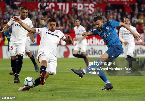 Borja Mayoral of Real Madrid shoots on goal past Daniel Carrico of Sevilla during the La Liga match between Sevilla and Real Madrid at Estadio Ramon...