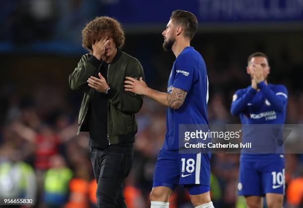David Luiz and Olivier Giroud of Chelsea after the Premier League match between Chelsea and Huddersfield Town at Stamford Bridge on May 9, 2018 in...