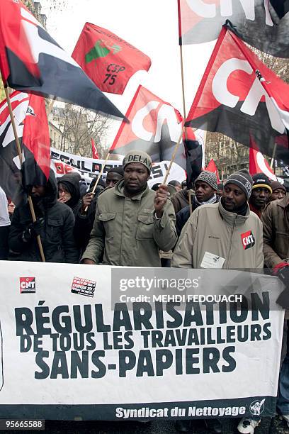 People protest during a demonstration called by association "Ministere de la Regularisation globale des tous les sans papiers" for the regularizing...