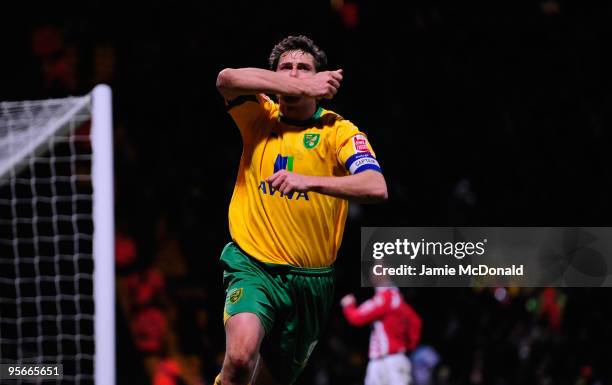 Grant Holt of Norwich City celebrates his second goal during the Coca Cola League One match between Norwich City and Exeter City at Carrow Road on...