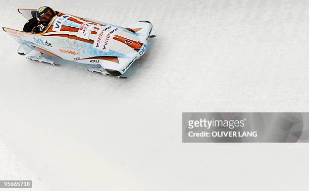Germany's Sandra Kiriasis und Senkel Christin race to place three of the women's two-men bobsleigh World Cup event in the southern German town of...
