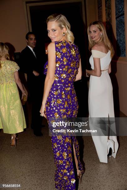 Poppy Delevingne and Lauren Santo Domingo attend the Heavenly Bodies: Fashion & The Catholic Imagination Costume Institute Gala at The Metropolitan...