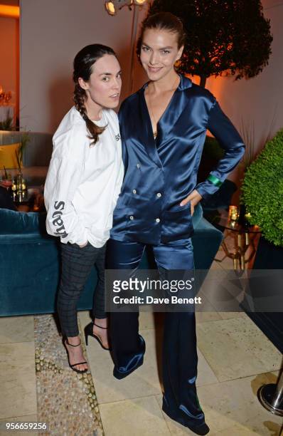 Tallulah Harlech and Arizona Muse attend Goga Ashkenazi's celebration of the 'Sustainable Surf' collaboration with Marc Quinn, with dinner at her...