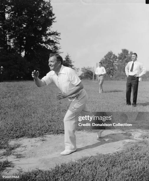 Solicitor General pitches. Fort Hunt, VA. Sept. 8. U.S. Solicitor General Robert H. Jackson pitched for his team "New Dealers" against the "Purges"...