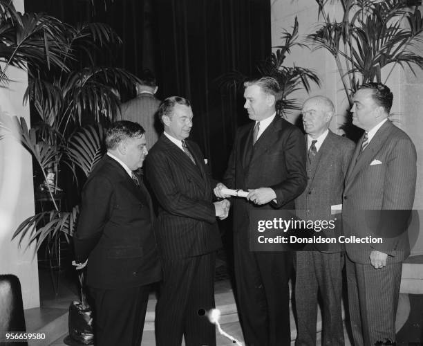 Group, includes Robert Jackson, 2nd from left; and J. Edgar Hoover, right.