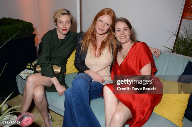 Camilla Rutherford, Olivia Inge and Chloe Beeney attend Goga Ashkenazi's celebration of the 'Sustainable Surf' collaboration with Marc Quinn, with...