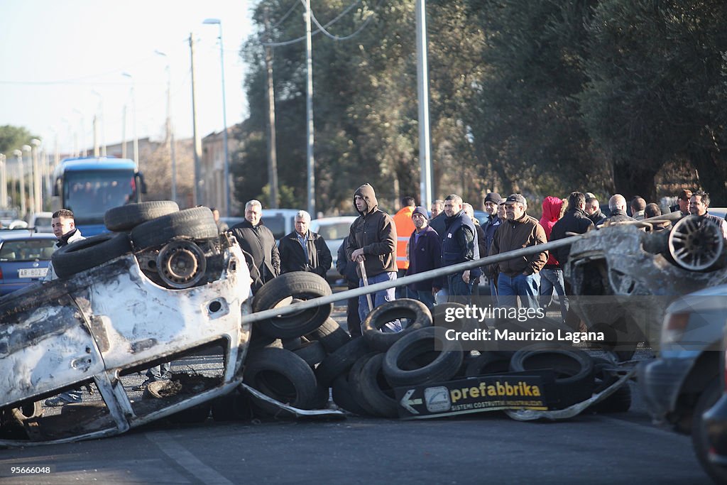 Immigrant Workers And Residents Demonstrate After Four Africans Are Wounded