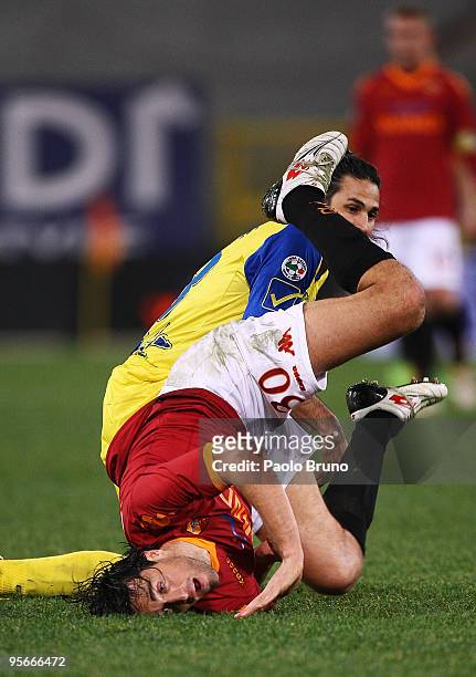 Luca Toni of AS Roma hits the ground during the Serie A match between Roma and Chievo at Stadio Olimpico on January 9, 2010 in Rome, Italy.